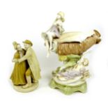 A Dux ceramic centrepiece, formed as a conch shell with two classical ladies draped beside it, a/f