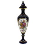 A mid 19th century porcelain vase, likely French, with silver fittings, decorated with sprays of