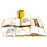 A collection five stamp and scrap book albums, including thirty-one penny red stamps, and a sheet of