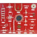 A mounted display of decorative, nautical knots, with Italian descriptions, 43.5 by 52.7cm, framed