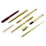 A collection of vintage pens, comprising a Montblanc Classic ballpoint pen, burgundy and gold, 13cm,