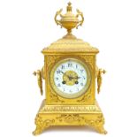 A French 19th century gilt metal mantel clock, with eight day movement, Arabic dial, decorative