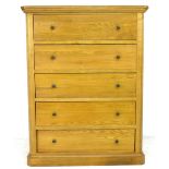 A contemporary oak chest of five drawers, with pine back, 101 by 46 by 130.5cm high.