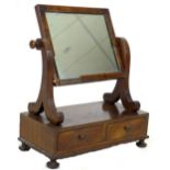 A late Victorian mahogany toilet mirror, with two trinket drawers, raised on bun feet, a/f, 43 by