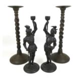 Two pairs of decorative candlesticks, comprising a pair of Art Nouveau spelter figural candlesticks,