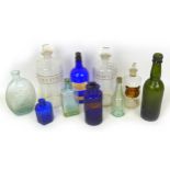 A collection of vintage chemist bottles and others, including a BDH hobnail cobalt Lysol poison