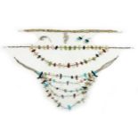 A group of Navajo silver and hardstone jewellery, comprising three necklaces set formed of carved