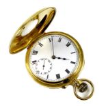 A George V 18ct gold cased half hunter pocket watch, keyless wind, the white enamel dial with