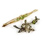 Two 9ct gold brooches set with peridot and pearls, largest 6.2cm, 6.7g combined. (2)