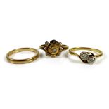An 18ct gold and diamond ring, the two stones each brilliant cut and within an illusion setting,