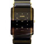 A Rado Diastar black ceramic and gold plated wristwatch, model 160.0282.3, serial 04989856, case