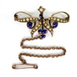 A 9ct rose gold, sapphire and seed pearl brooch, 3.7cm, with safety chain, 4.2g.