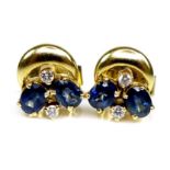 A pair of 18ct gold, sapphire and diamond earrings, each formed of two oval cut sapphires and two