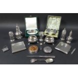 A collection of silver items, including a pair of Victorian cauldron salts, raised on three hoof