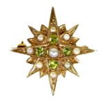 A 9ct gold starburst brooch set with peridot and pearls, 3.1cm diameter, 4.0g.