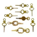 A group of watch keys, comprising two gold examples, one 18th century and set with white and red