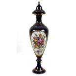 A mid 19th century porcelain vase, likely French, with silver fittings, decorated with sprays of