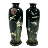 A pair of Japanese cloisonnŽ enamelled vases, early to mid 20th century, on midnight blue grounds,