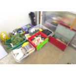 Eight boxes of DIY tools and gadgets along with a bagged collapsible table, 12 saws and a bag of