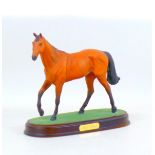 A Royal Doulton figurine of the racing horse Red Rum, raised upon a wooden plinth, 25.5 by 10.5 by