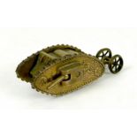 A WWI trench art brass Mk 1 tank, with two side guns, and rear steering wheels, 13 by 4.8 by 4.2cm