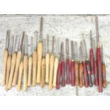 Twenty-five lathe chisels, including some by Record Power Ltd. (1 box)