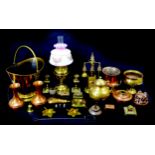 A group of copper and brass items, including a Victorian jelly mould, stamped '375', coal scuttle,