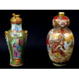 Two Oriental vases, comprising a small Cantonese porcelain lidded vase, 10 by 24.5cm high, and a