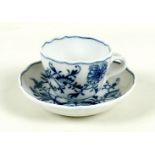 A Meissen porcelain cup and saucer, early to mid 19th century, with scalloped rim, the cup with