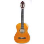 A 3/4 size Valencia nylon six string classical guitar, together with soft case.