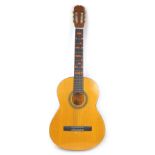 A BM Espana classical guitar with soft case.