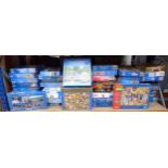 A group of approx 57 boxed jigsaw puzzles. (qty)