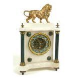 A French alabaster mantel clock, early 20th century, with gilt metal lion surmount, the open dial
