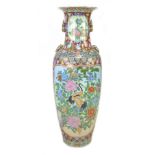 A gargantuan 20th century Oriental style vase, of baluster form with gilt lug handles, its reserves