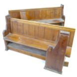 Two Victorian Church pine pews, each with numbered detached end, 178 by 47 by 93.5cm high and 192 by