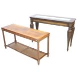 Two 20th century console tables, comprising a walnut veneer console with caned undershelf, 132 by