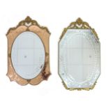 Two 20th century gilt framed wall mirrors, with reversed etched designs, one of octagonal form, 62.5
