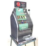 A vintage Sega Monaco one-armed-bandit, slot machine, with stand and assorted tokens, without key
