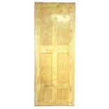 A unopened plastic wrapped pine door, with six panels, 76.5 by 3.5 by 196cm high.