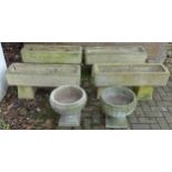 Six stoneware garden planters, comprising four Sandford stone raised troughs, 86 by 26 by 41cm high,