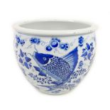 A Chinese porcelain blue and white fish bowl, decorated with fish and foliate detail, 22.5 by 18cm