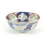 An early 20th century Japanese porcelain Imari bowl, 21 by 9cm high.