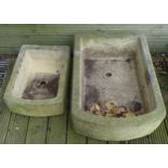Two Sanford Stone troughs, small trough measures 52 by 38 by 18cm high, large trough measures 73