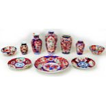 A collection of Japanese porcelain, Meiji period and later, all decorated in the imari pattern,
