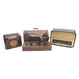 A mixed group of collectables, including a vintage Singer hand crack sewing machine with case,