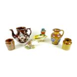 A group of ceramics, comprising a Doulton Lambeth farming interest harvest ware pitcher jug, applied