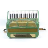 A vintage Hohner piano accordion, Lucia II Musette, pale green, in working order.