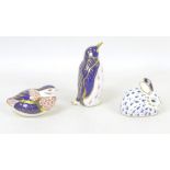 Three Royal Crown Derby paperweights, modelled as a penguin, 13.5cm high, a partridge, 6cm high, a