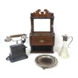 A group of collectables, comprising a vintage wind up telephone with bakelite handle, 30cm high,