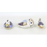 Three Royal Crown Derby paperweights, modelled as a blue owl, 7cm high, a duck, 7cm high, and a